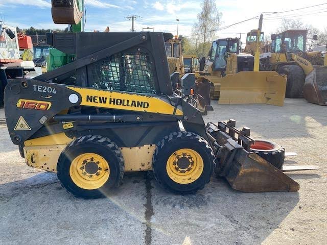 x1-6.jpeg New Holland L160, (2006) – occasion – Image 1